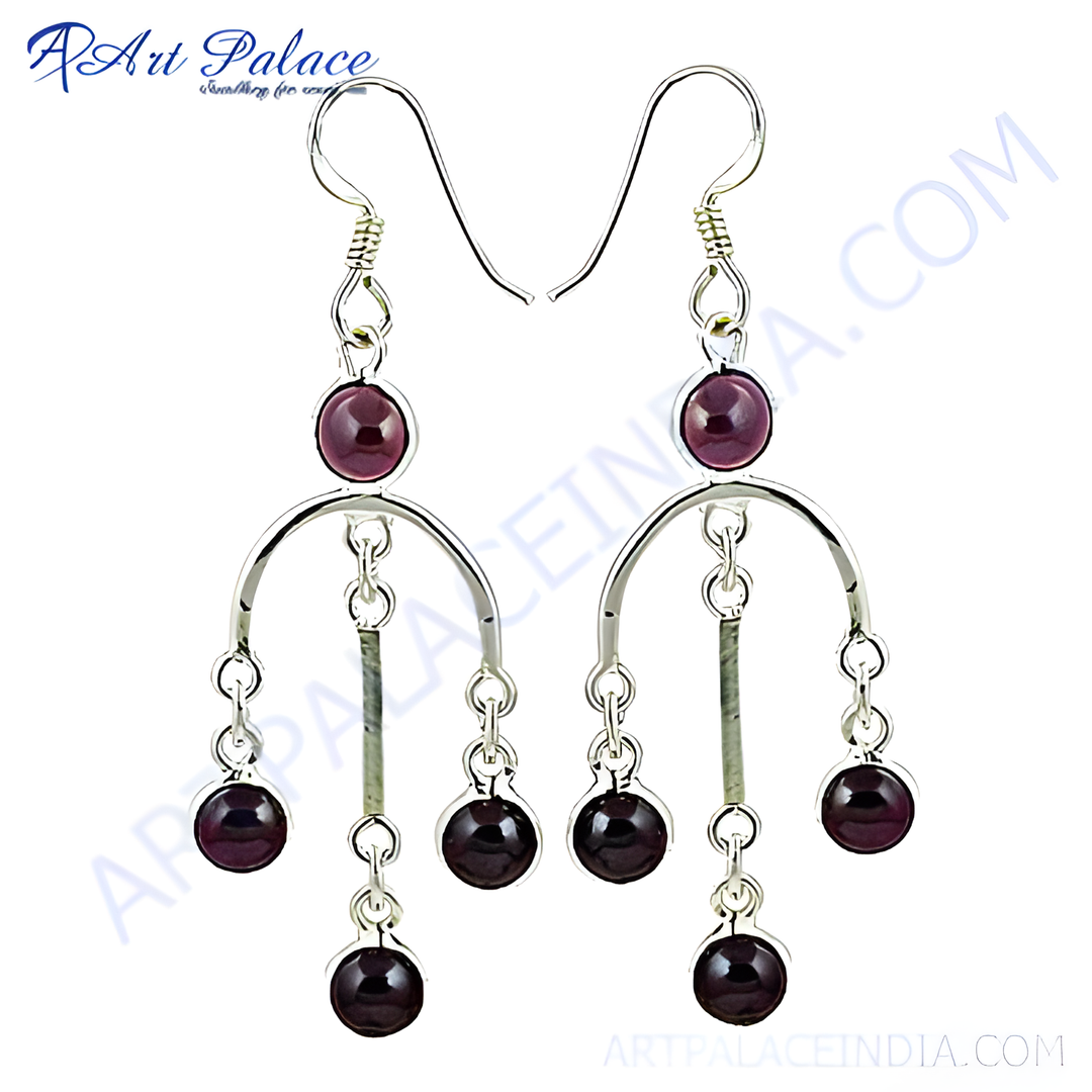 Sterling silver dangle earrings with dark red garnet gemstones. Women's jewelry.