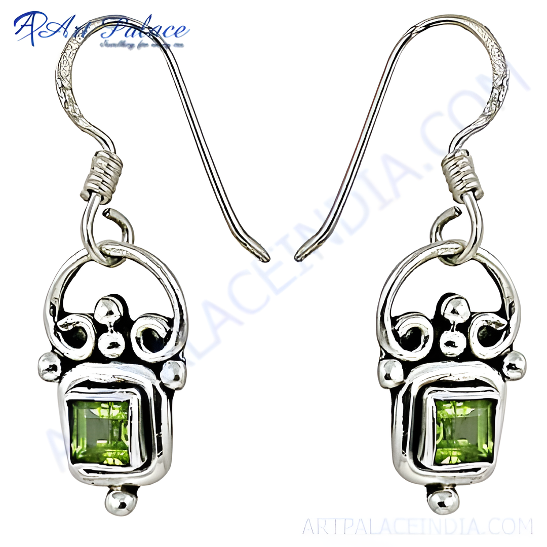 925 sterling silver drop earrings with square-cut peridot gemstones, featuring a vibrant green color.