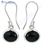 Load image into Gallery viewer, Sterling silver drop earrings with oval black onyx gemstones, perfect for any occasion.
