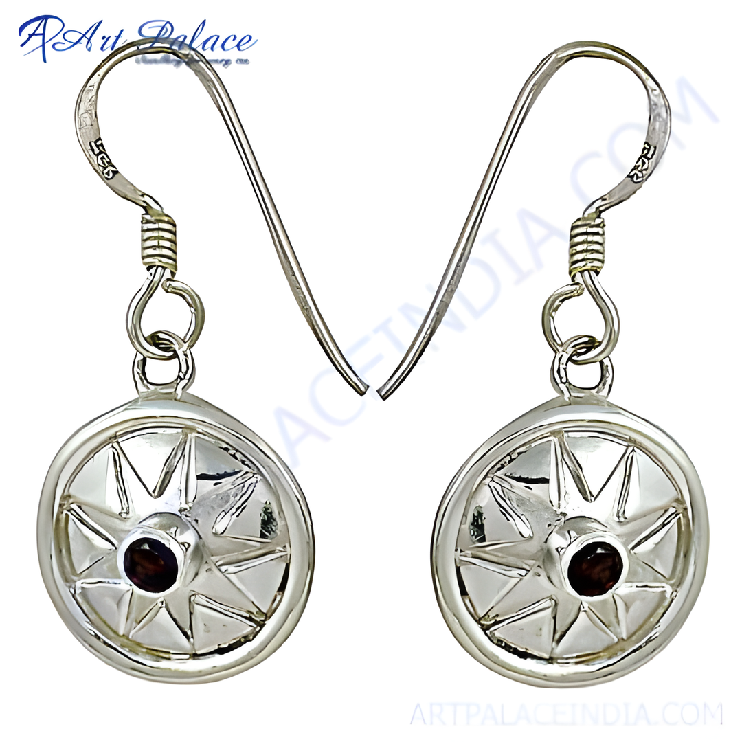 925 sterling silver dangle earrings featuring a red garnet gemstone with starburst design