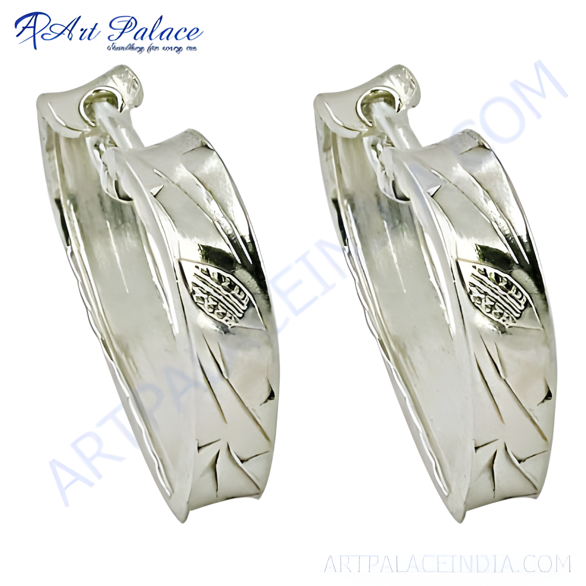 Close up of elegant silver hoop earrings on a white background, perfect for women's daily wear