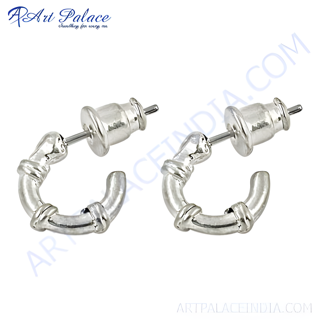 Silver hoop earrings with a unique knot design, perfect for women.