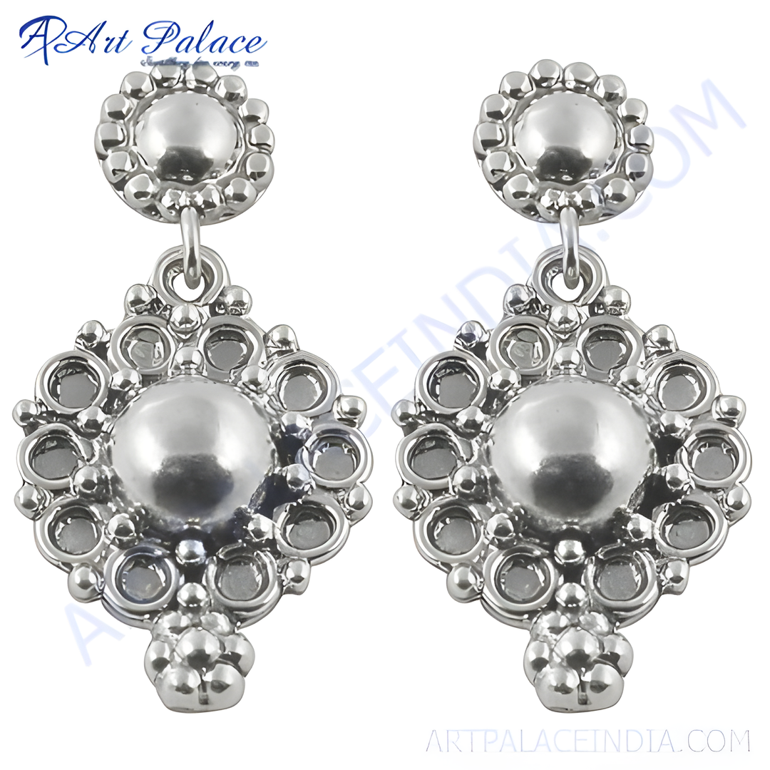 Sterling silver dangle earrings with filigree design, featuring a classic, elegant style, perfect for everyday wear.