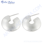Load image into Gallery viewer, A pair of shiny silver half-hoop earrings displayed on a white background.
