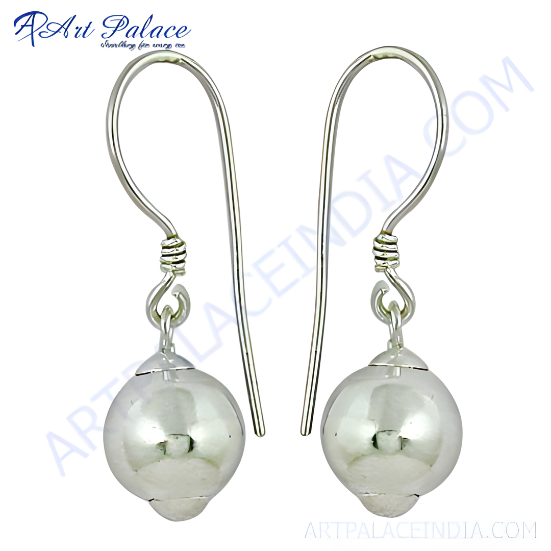 Sterling silver dangle ball earrings, featuring a polished finish, perfect for everyday wear and gifting.