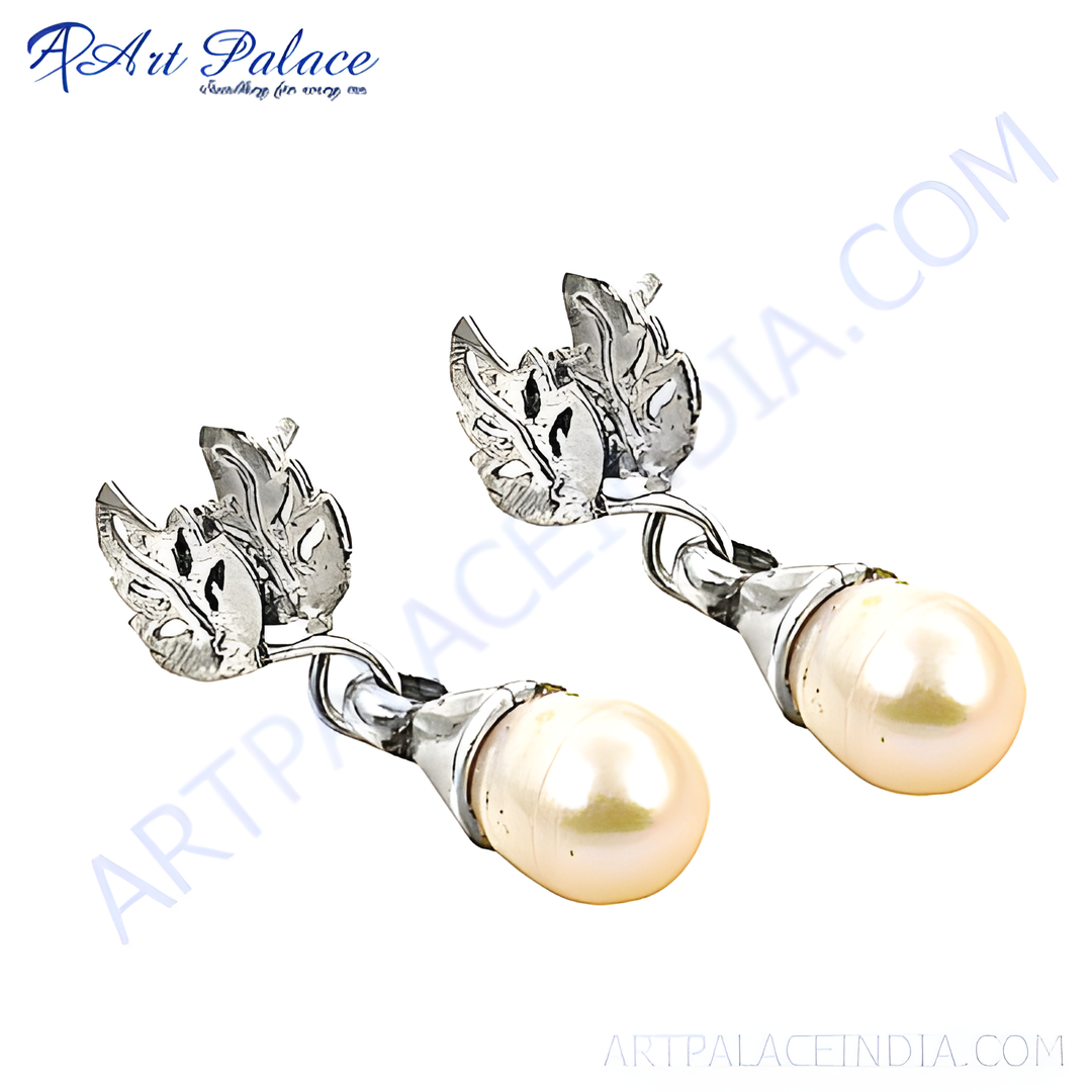 Silver drop earrings with leaf design and elegant pearl accents, perfect for women.
