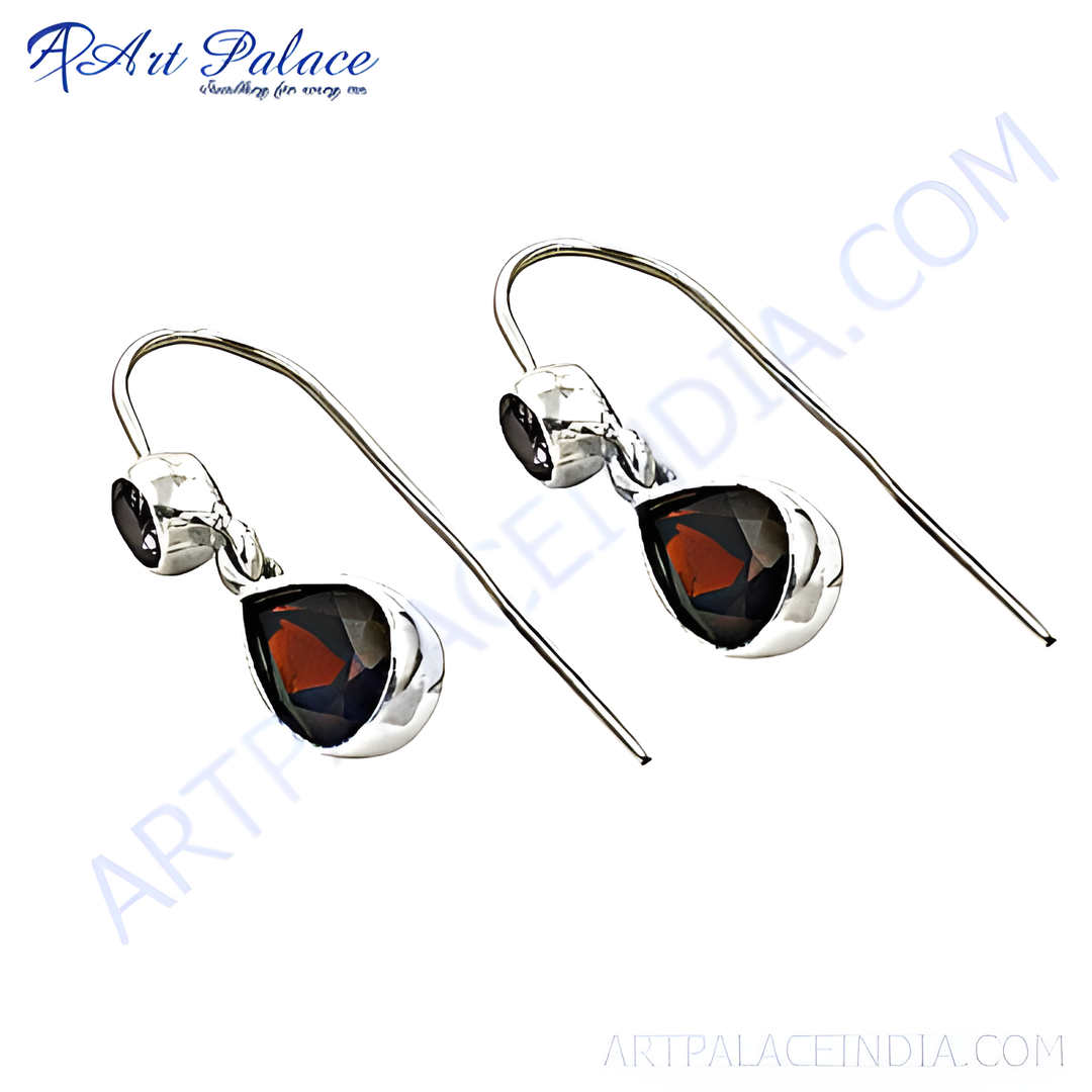 925 sterling silver teardrop earrings with red garnet gemstones. Dangle earring design.