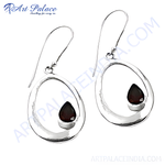 Load image into Gallery viewer, 925 sterling silver dangle earrings with a teardrop design and a red garnet gemstone.
