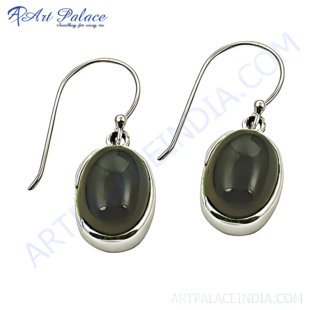 Sterling silver drop earrings with oval black onyx gemstones. Elegant and classic design.