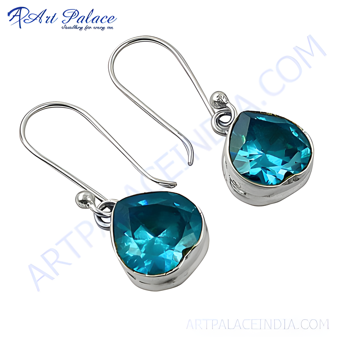 925 silver drop earrings with a vibrant blue topaz gemstone. Elegant and suitable for daily wear.