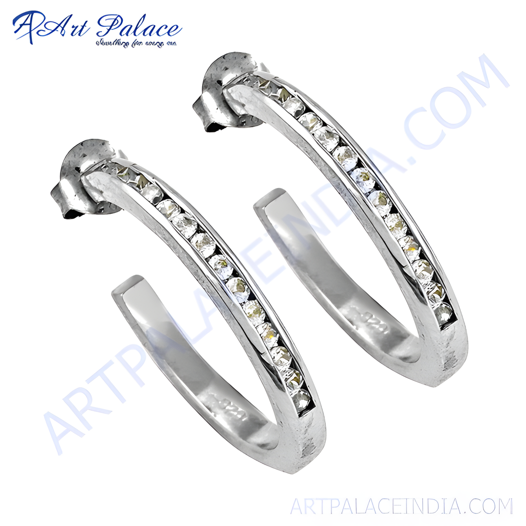 925 sterling silver hoop earrings with clear cubic zirconia stones. Classic and elegant design.
