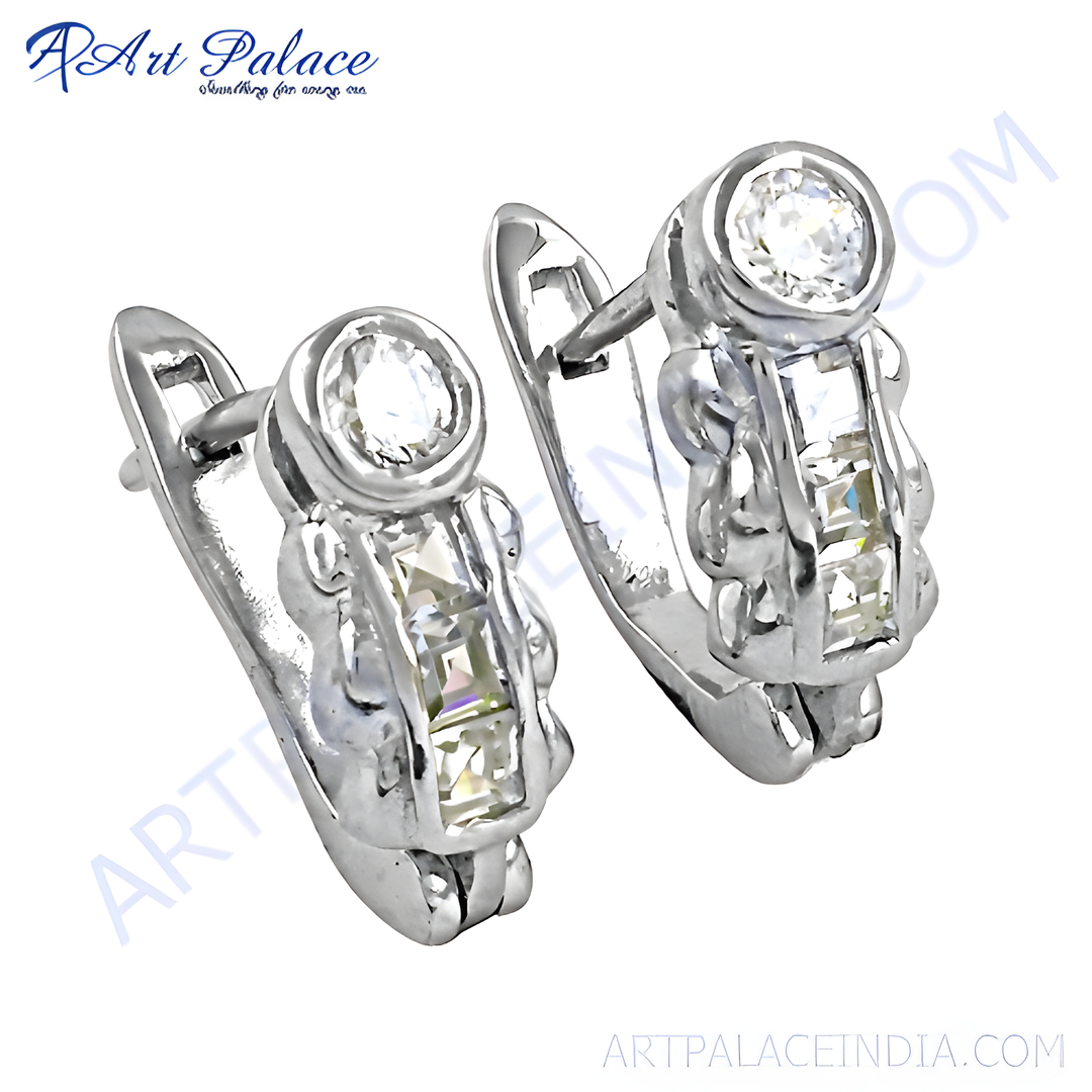 Silver hoop earrings with sparkling cubic zirconia stones, perfect for women's jewelry and gifting.