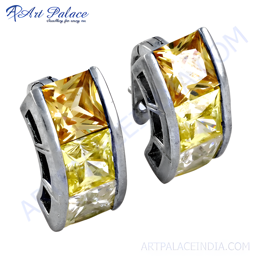 Silver hoop earrings with vibrant yellow cubic zirconia gemstones. A stylish and elegant jewelry piece for women.