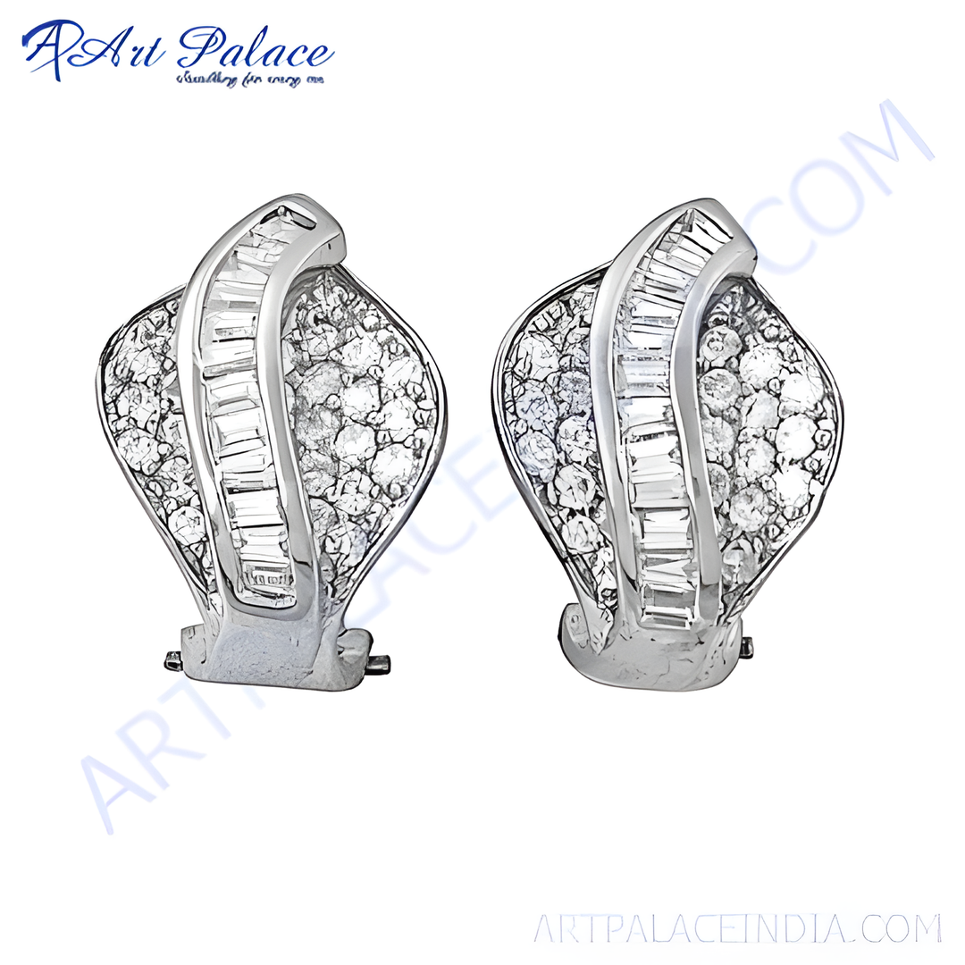 Diamond stud earrings in white metal, featuring sparkling round and baguette-cut diamonds, for women.