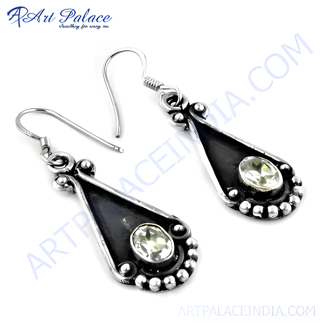 925 sterling silver dangle earrings with a teardrop design and lemon quartz gemstone.
