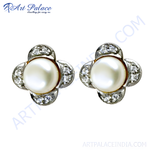 Load image into Gallery viewer, Pearl and diamond stud earrings with a clover design, set in a silver metal.
