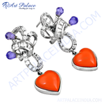 Load image into Gallery viewer, Silver dangle earrings with heart-shaped red gemstones and purple accents.
