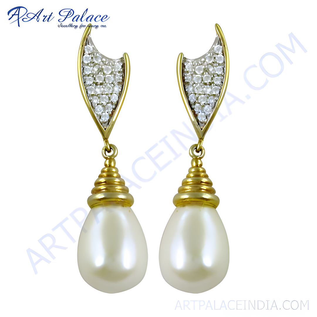 Gold teardrop pearl drop earrings with sparkling stones, a beautiful piece of jewelry