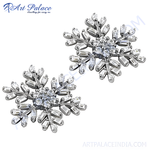 Load image into Gallery viewer, Silver snowflake stud earrings with sparkling cubic zirconia gemstones. A winter-themed, elegant jewelry design.
