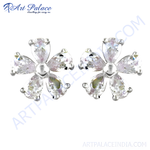 Load image into Gallery viewer, Sterling silver stud earrings with a flower design and clear cubic zirconia stones.
