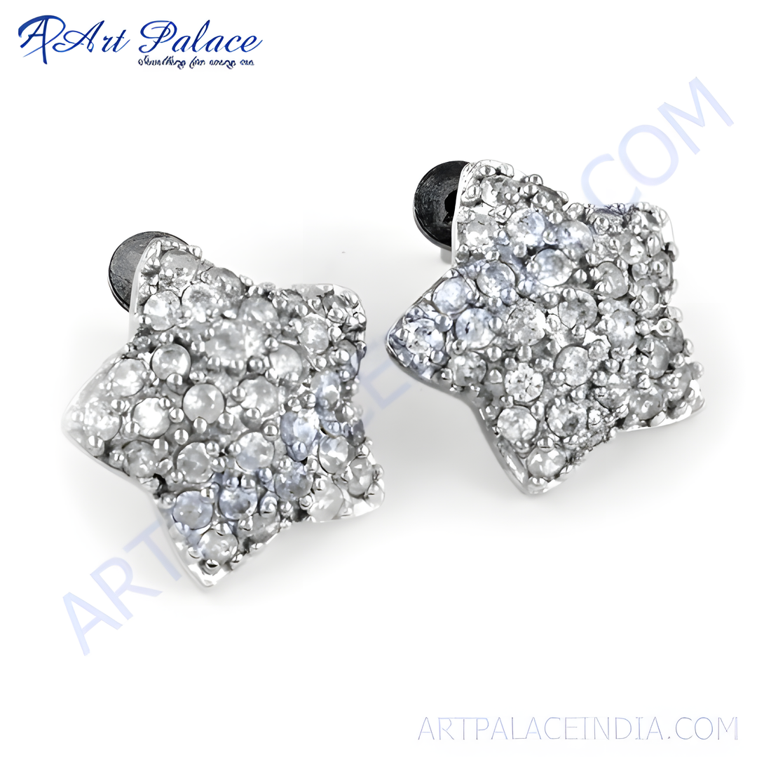 Sterling silver star shaped stud earrings with sparkling cubic zirconia stones.