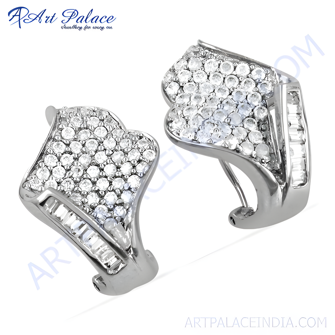 Silver stud earrings with round and baguette-cut cubic zirconia stones. A beautiful and elegant design.