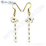 Load image into Gallery viewer, Elegant pearl drop earrings with gold-toned metal accents, featuring multiple lustrous pearls.
