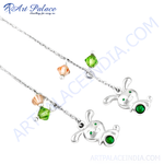 Load image into Gallery viewer, Sterling silver charm bracelet with bunny charms and green gemstone accents.
