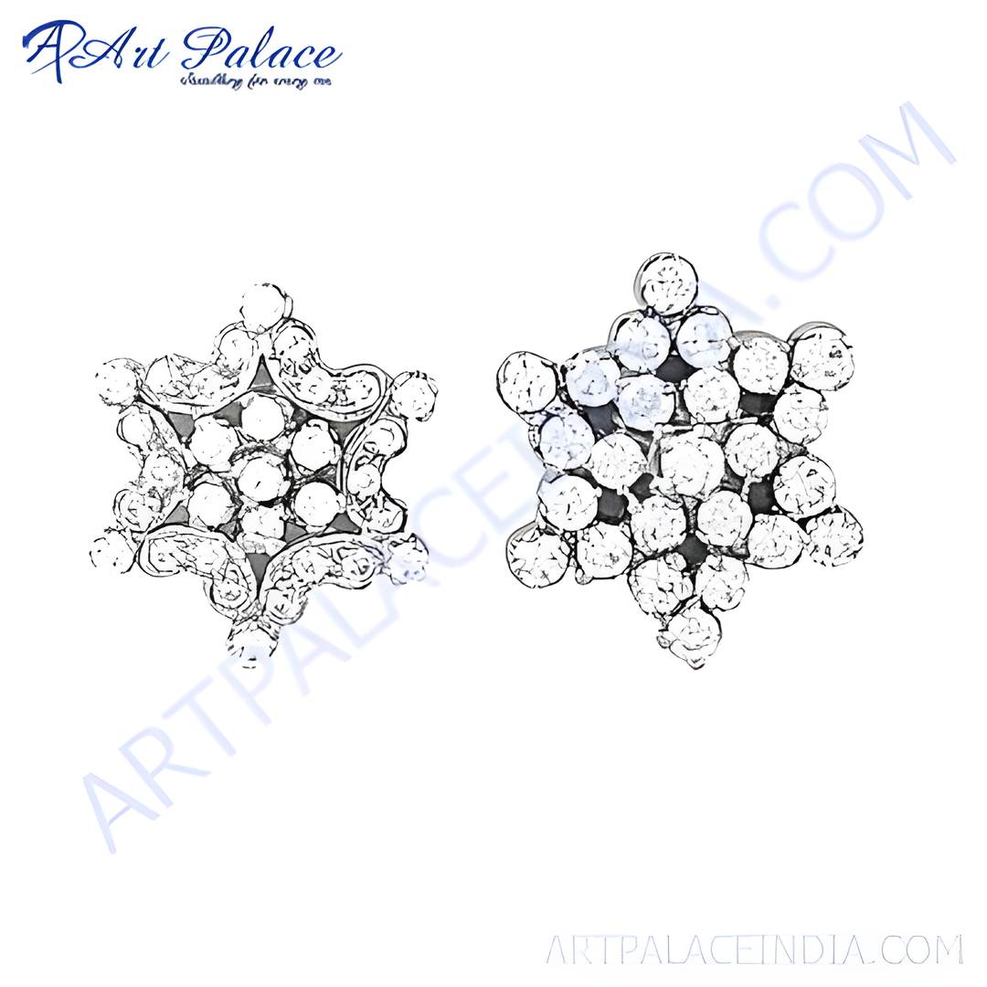 Silver snowflake stud earrings with sparkling crystals. Elegant jewelry for women.