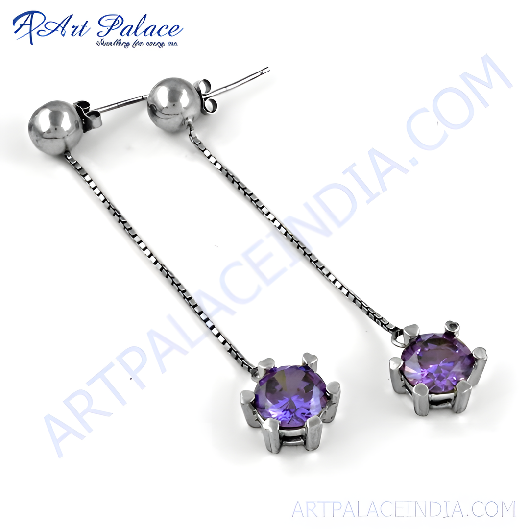 Silver drop earrings with sparkling purple gemstone. A beautiful piece of jewelry for women.