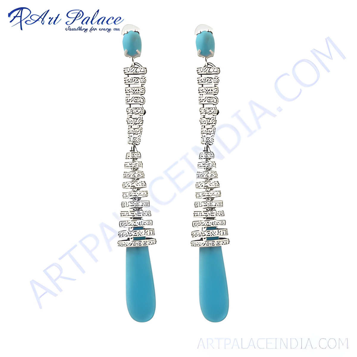 Elegant silver drop earrings featuring turquoise stones, perfect for adding a touch of color and sophistication