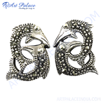 Load image into Gallery viewer, Intricately designed silver bird mask earrings on a white background, statement jewelry.
