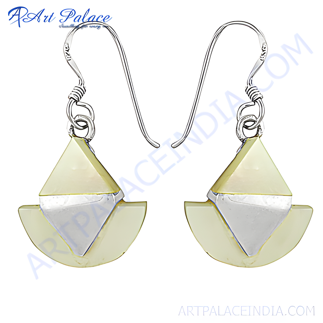 Silver geometric drop earrings with silver hooks, and unique fan-shaped design with a contrast of materials.