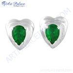 Load image into Gallery viewer, Heart-shaped silver stud earrings with vibrant green emerald gemstones, perfect for any occasion.
