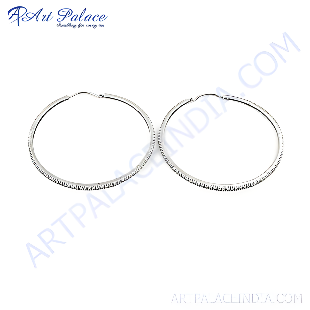Sterling silver hoop earrings with textured detail on a white background, perfect for daily wear