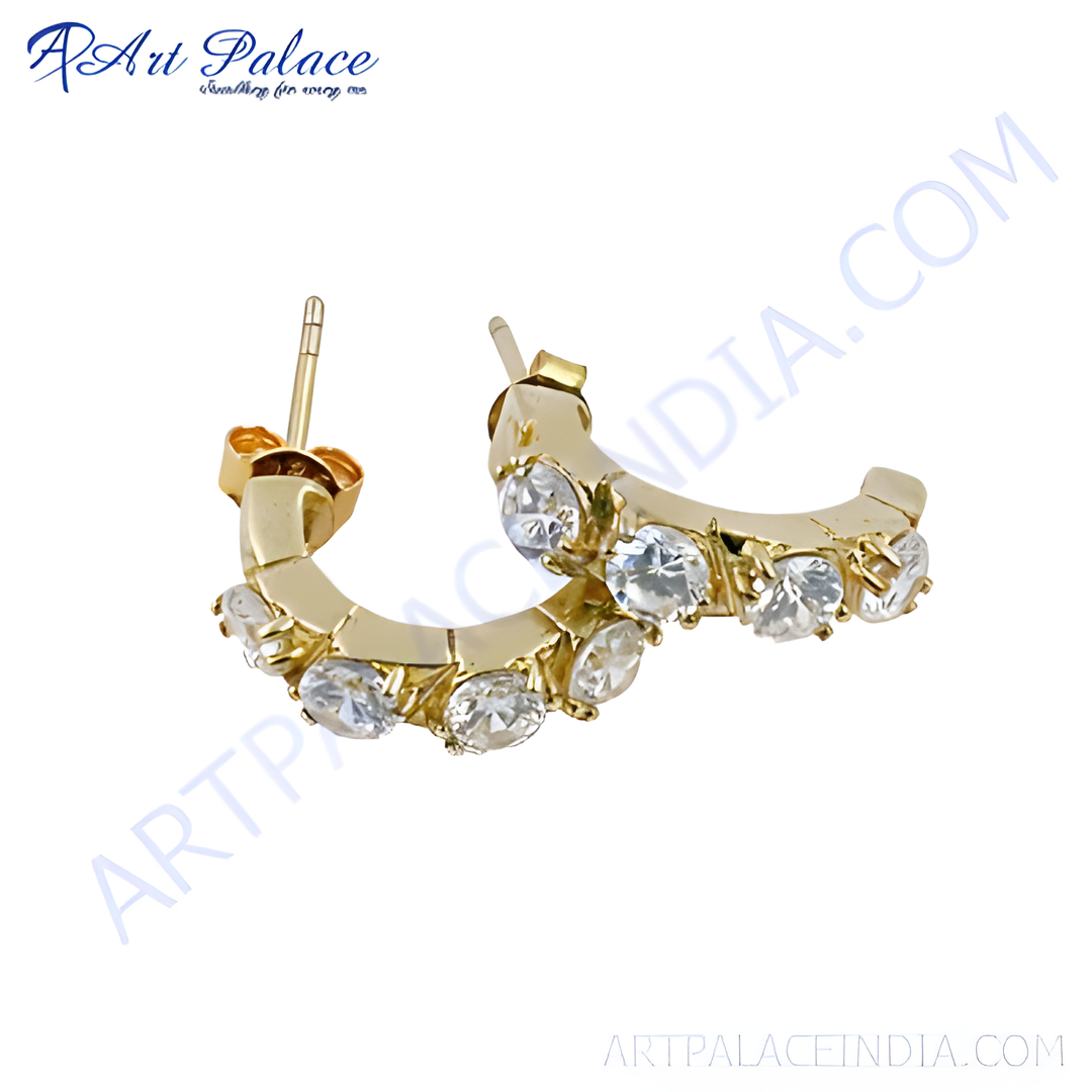 Gold hoop earrings with round-cut, clear cubic zirconia stones. A beautiful, sparkling jewelry piece.