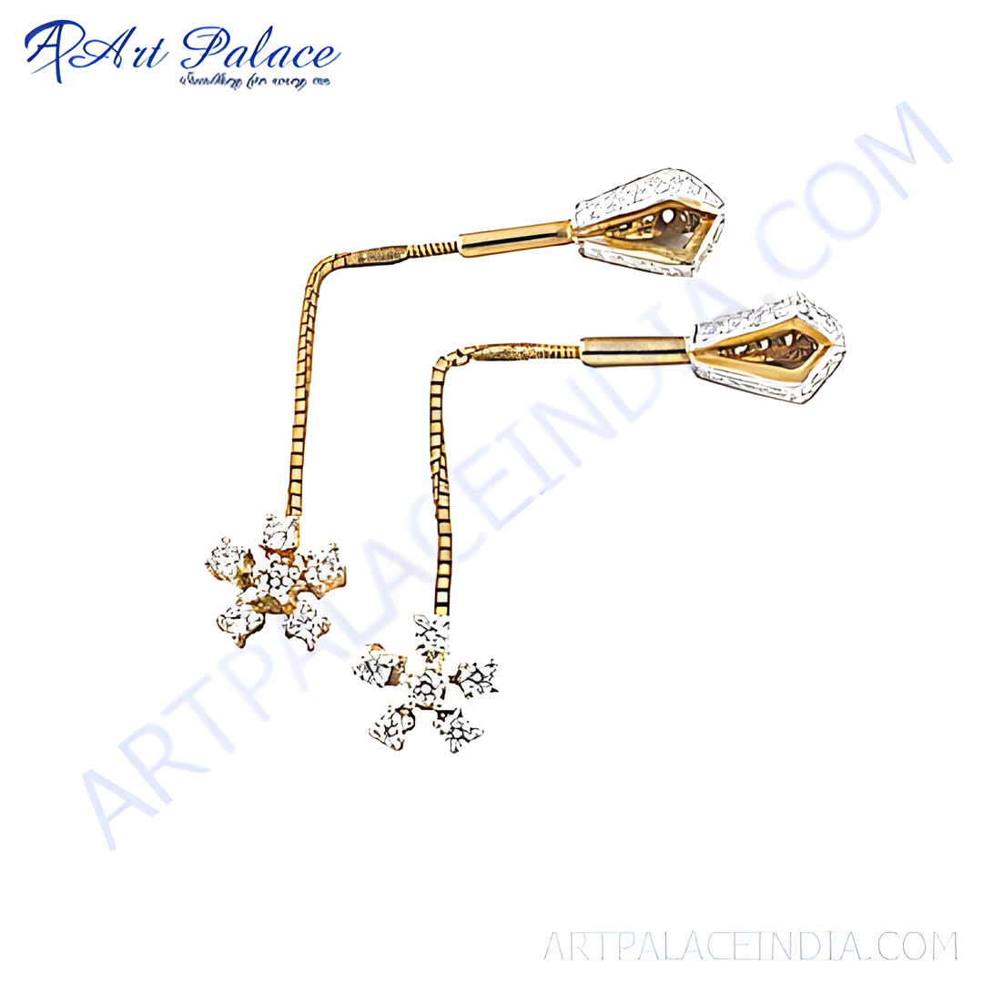 Gold drop earrings featuring a diamond snowflake design, perfect for a sophisticated look.