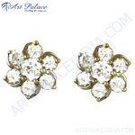 Load image into Gallery viewer, Gold flower stud earrings featuring multiple clear diamonds. Elegant, floral design perfect for women.
