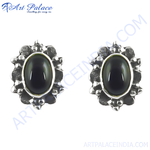 Load image into Gallery viewer, 925 sterling silver stud earrings with oval black onyx gemstones, perfect for any occasion.

