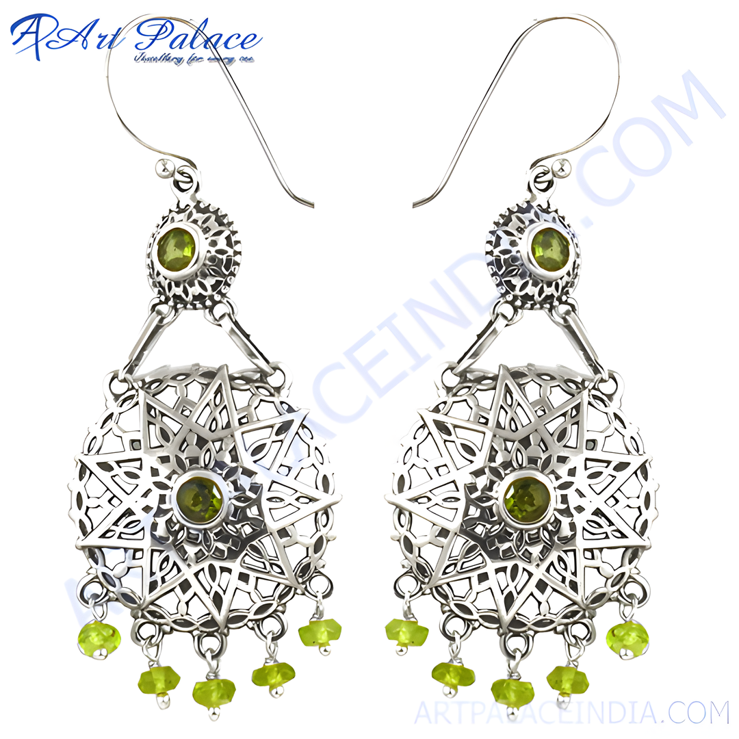 Sterling silver dangle earrings with peridot gemstones. Features a detailed filigree design and a secure hook closure.
