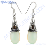 Load image into Gallery viewer, 925 sterling silver opal teardrop dangle earrings with brown accents.
