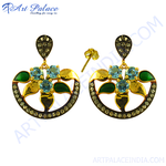 Load image into Gallery viewer, Gold dangle earrings with gemstones and cubic zirconia detailing.
