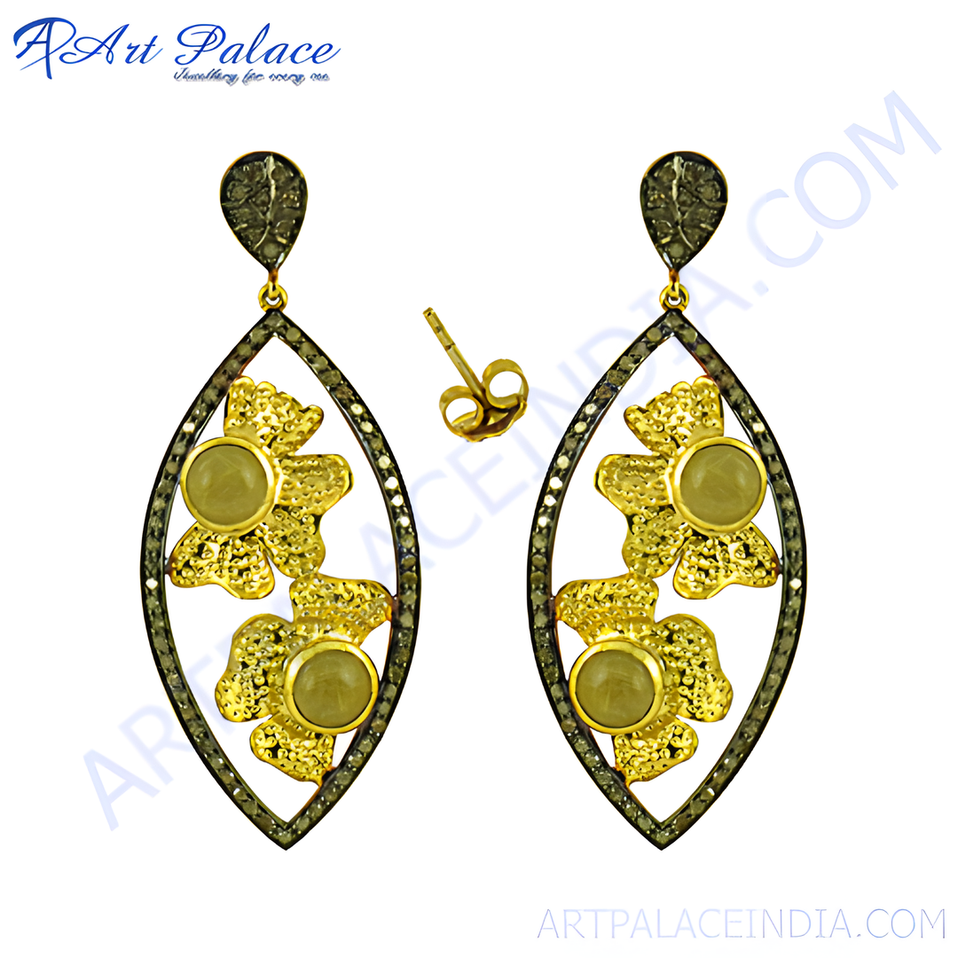 Gold drop earrings with a floral design and gemstones, perfect for any occasion.