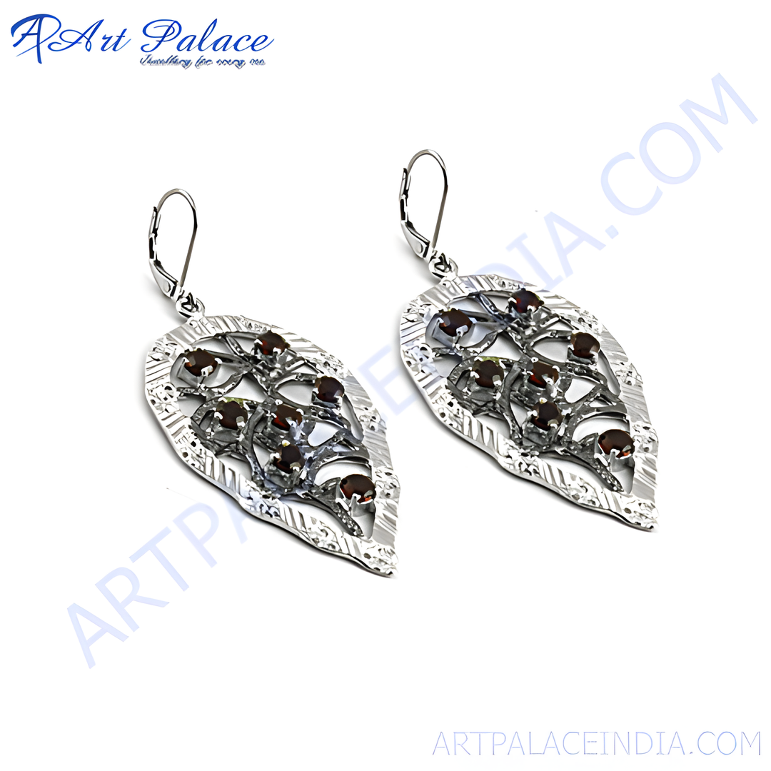 Sterling silver drop earrings with a leaf design and red garnet gemstones, perfect for women.