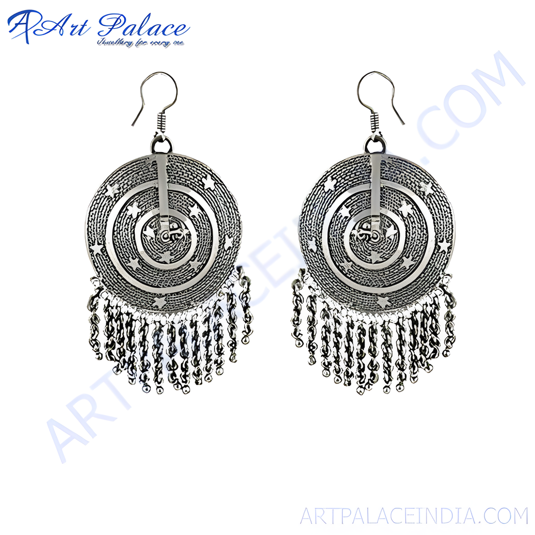 Oxidized silver dangle earrings with star and spiral design, perfect for women. Ethnic silver earrings.