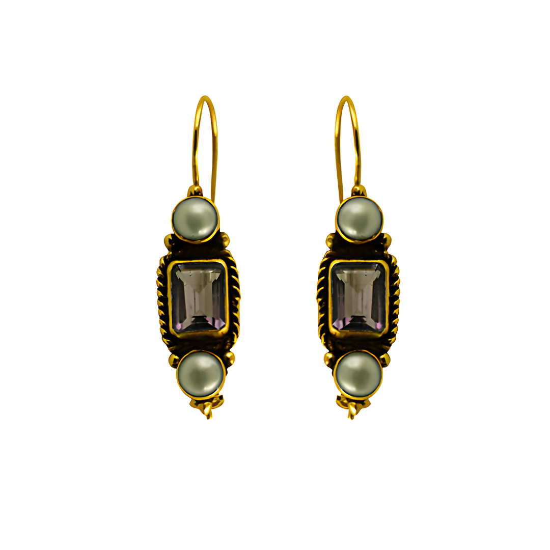 Gold drop earrings featuring a rectangular gemstone and pear-shaped gemstones, perfect for any occasion.