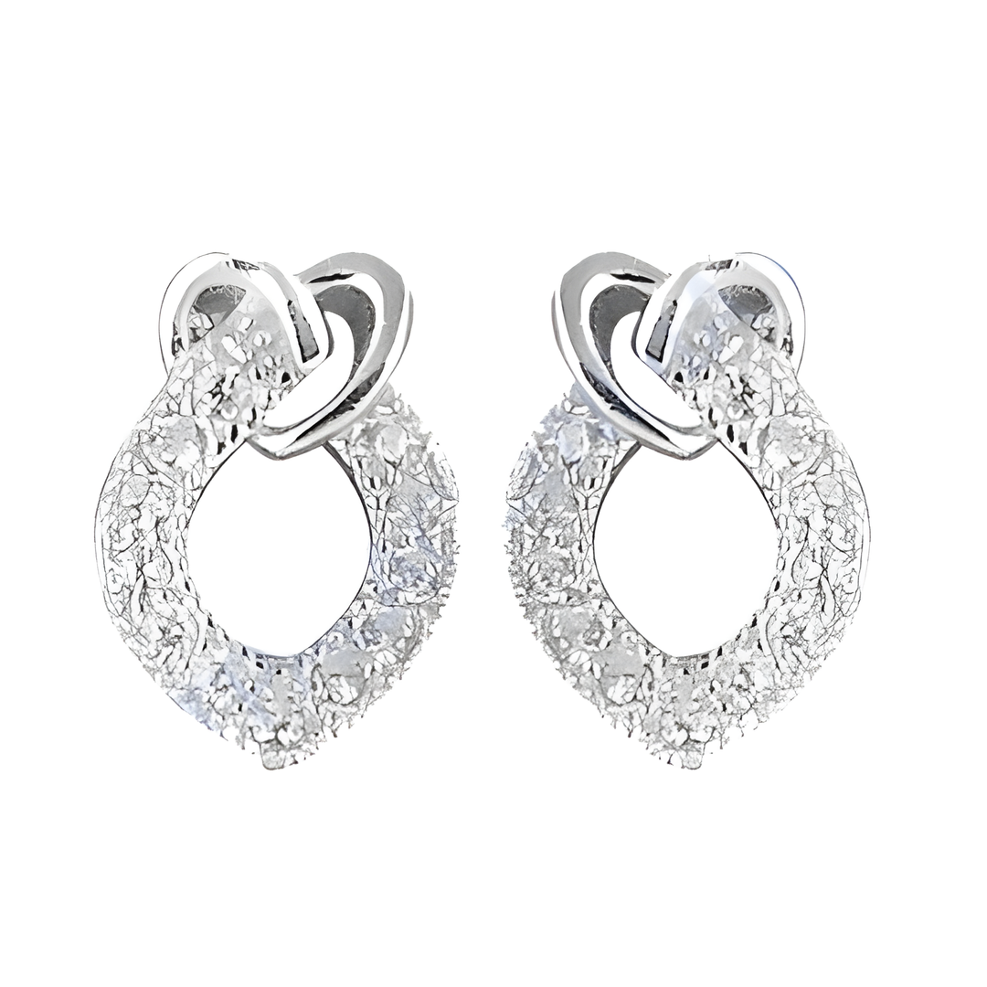Silver drop earrings with sparkling cubic zirconia stones, elegant design.