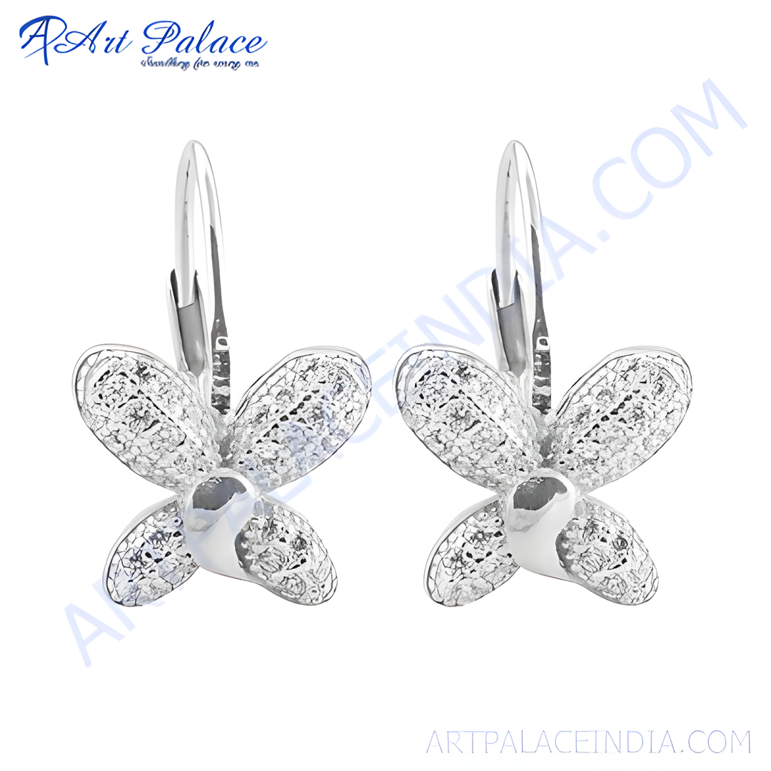 Silver flower dangle earrings with sparkling cubic zirconia stones, perfect for women's jewelry.