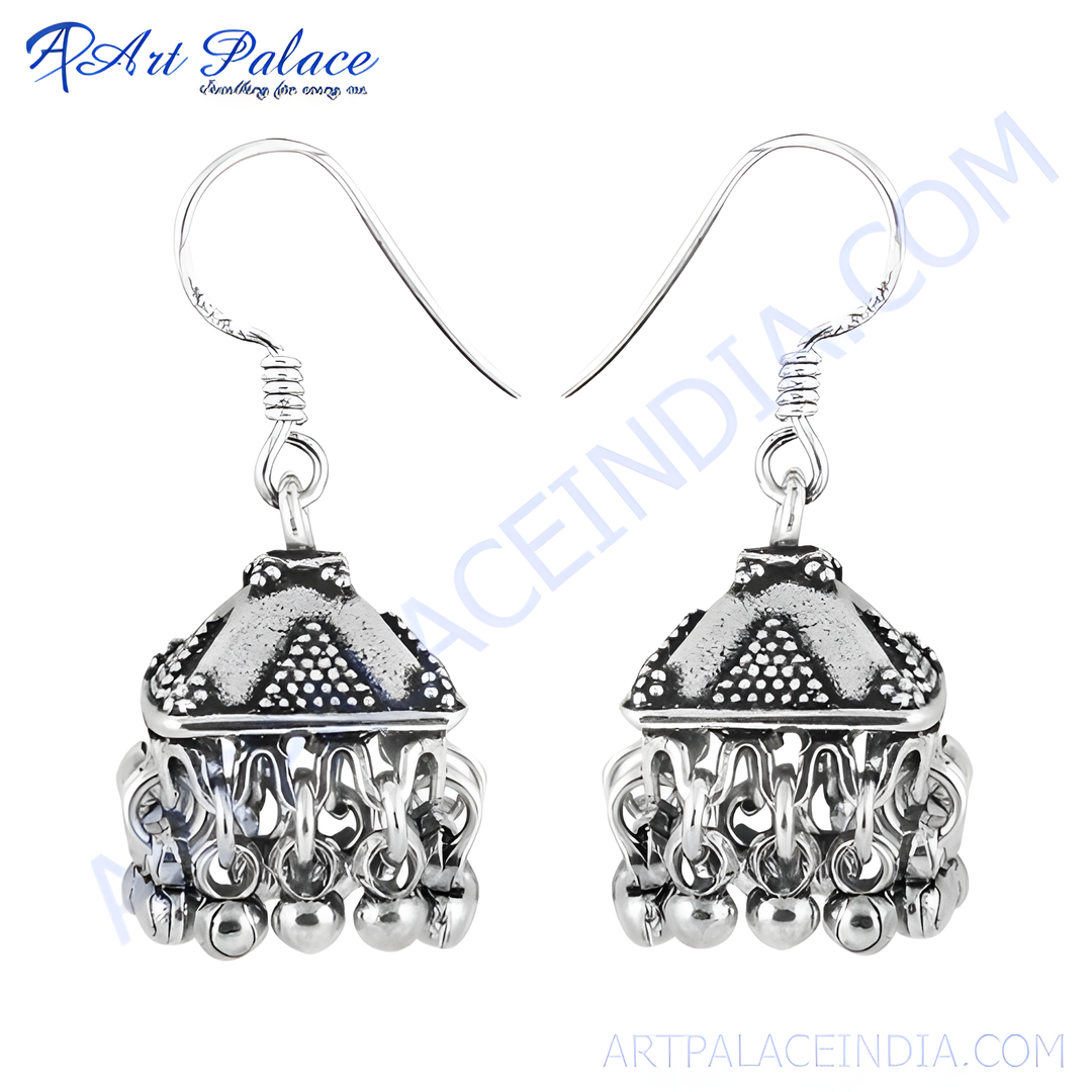 925 sterling silver Jhumka earrings with intricate detailing, a classic Indian design.
