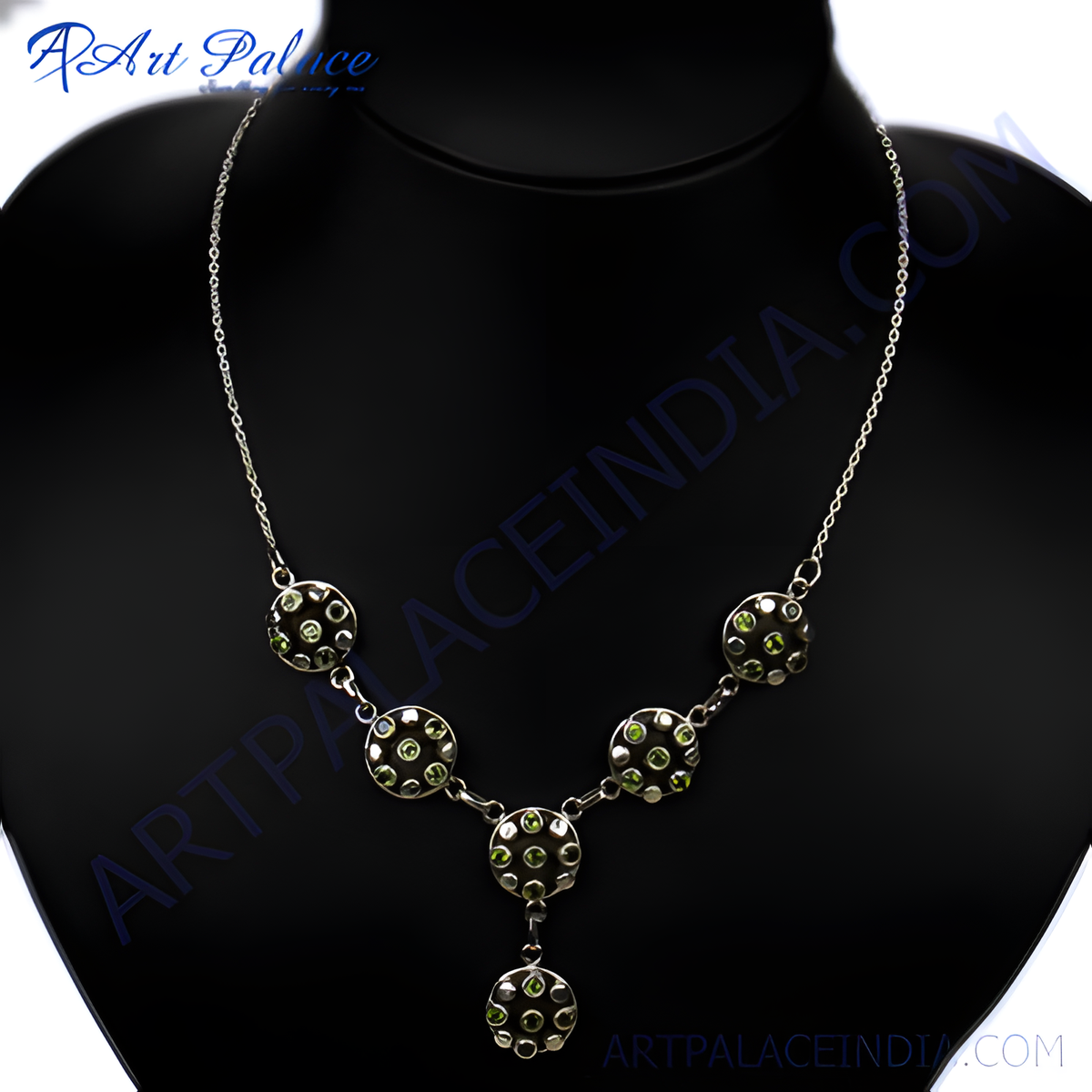 Sterling silver necklace with green gemstones set in circular pendants, perfect for women